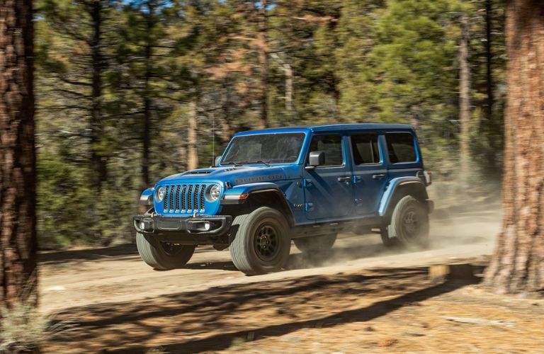 The Wrangler Rubicon with Xtreme Recon Package making its way through the woods